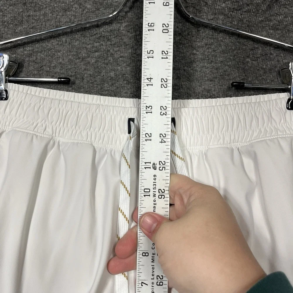 Rhone Pursuit Shorts Mens M White Lined Drawstring performance 4.5